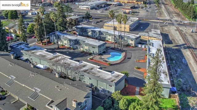 an aerial view of a house with outdoor space