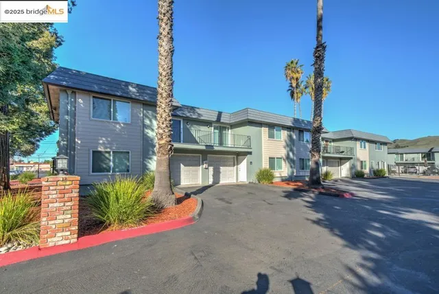 a view of a house with a street