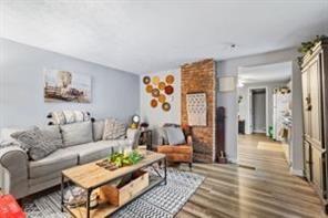 118 Constitution Street Perryopolis, PA 15473 - Photo 17 of 34 a living room with furniture and a rug