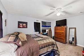 118 Constitution Street Perryopolis, PA 15473 - Photo 27 of 34 a bedroom with a bed and a flat screen tv