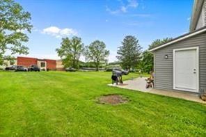 118 Constitution Street Perryopolis, PA 15473 - Photo 32 of 34 a view of a backyard with a garden