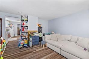 118 Constitution Street Perryopolis, PA 15473 - Photo 5 of 34 a living room with furniture and a wooden floor