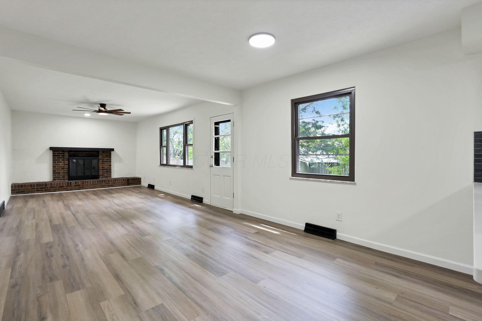 1883 Fairhaven Road Columbus, OH 43229 - Photo 79 of 79 Nice open floorplan with family room and fireplace focal point!