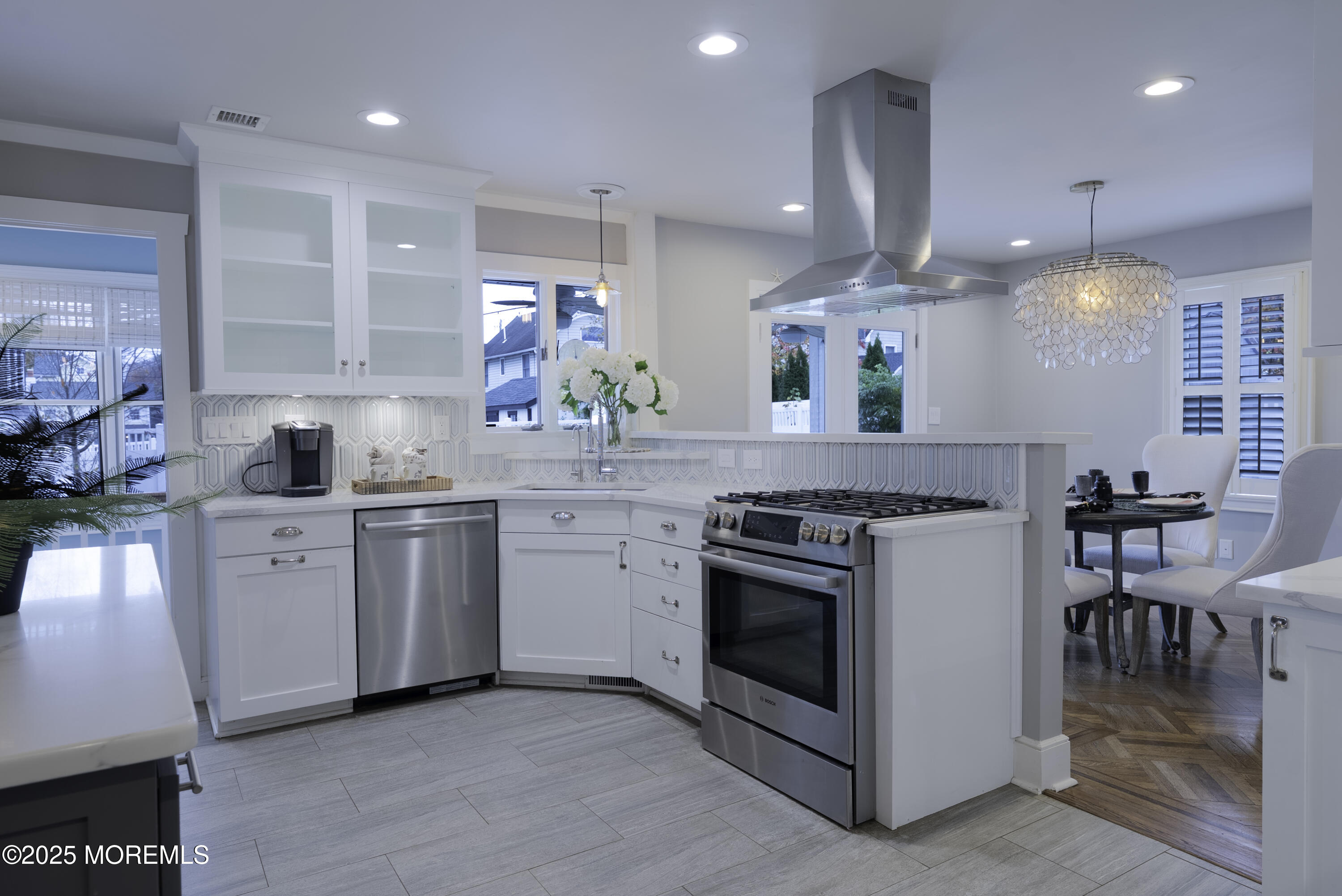 7 Allen Street Rumson, NJ 07760 - Photo 11 of 36 a kitchen with a sink stove and cabinets