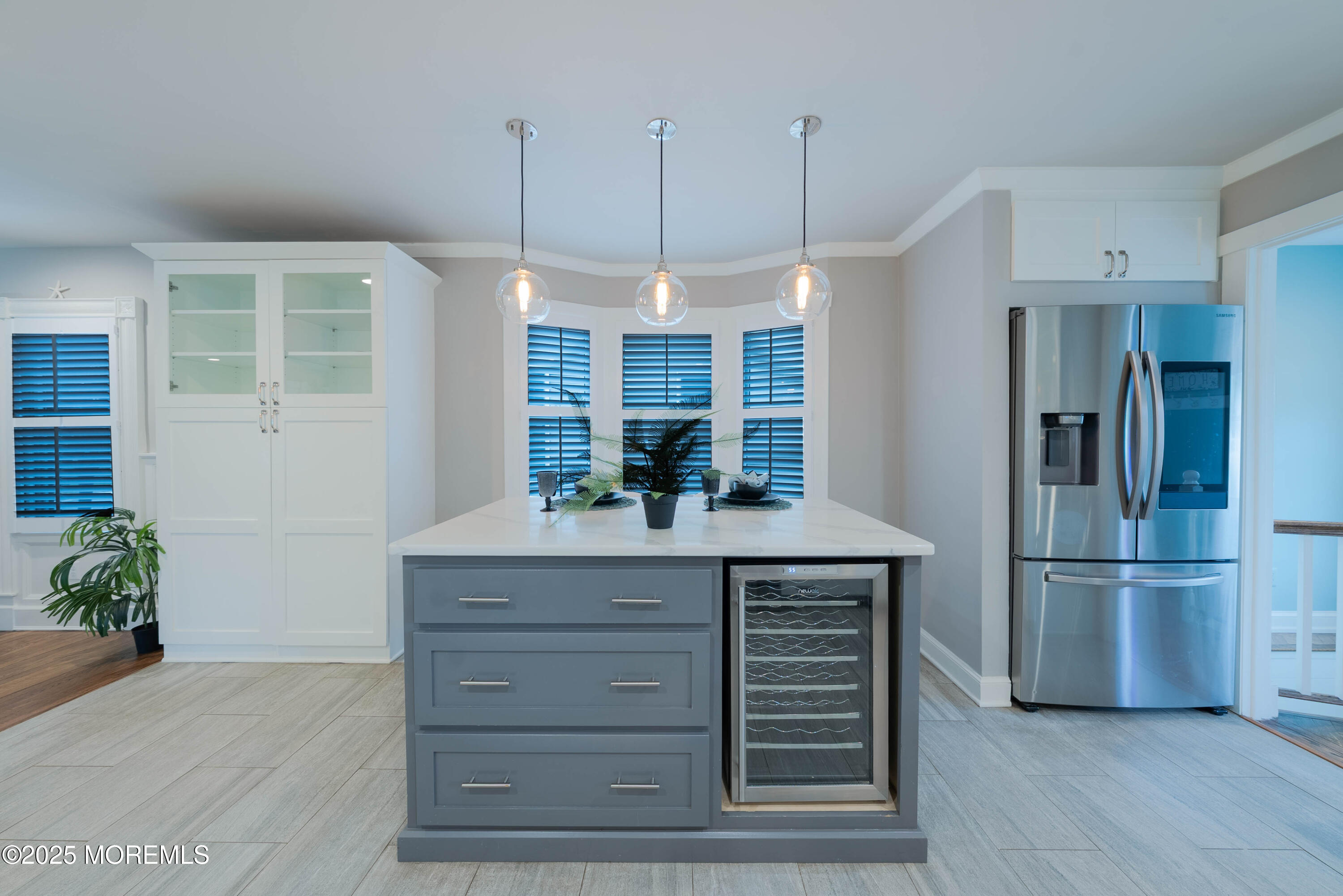 7 Allen Street Rumson, NJ 07760 - Photo 14 of 36 a kitchen with refrigerator and cabinets