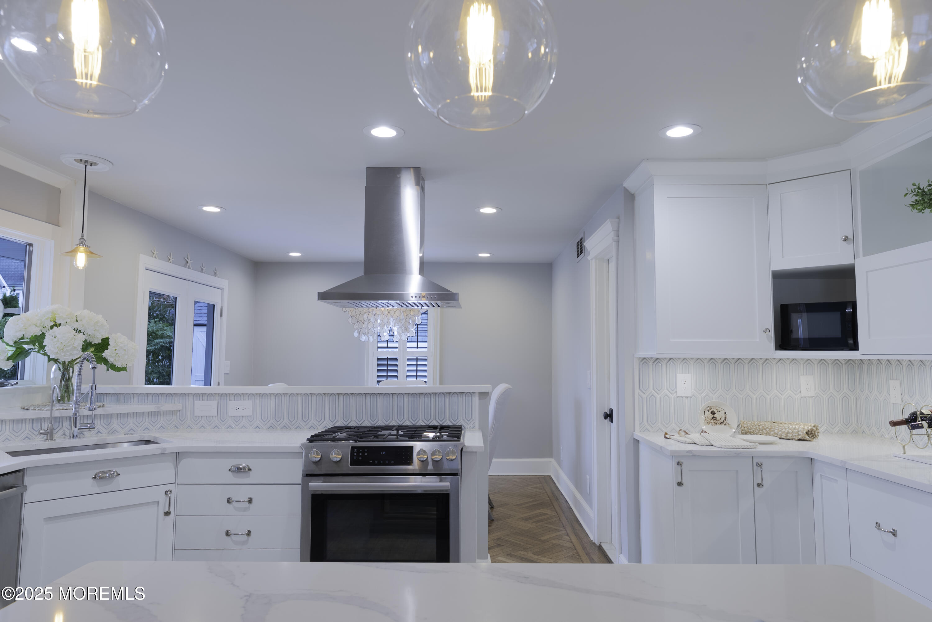 7 Allen Street Rumson, NJ 07760 - Photo 15 of 36 a kitchen with a sink stove and microwave