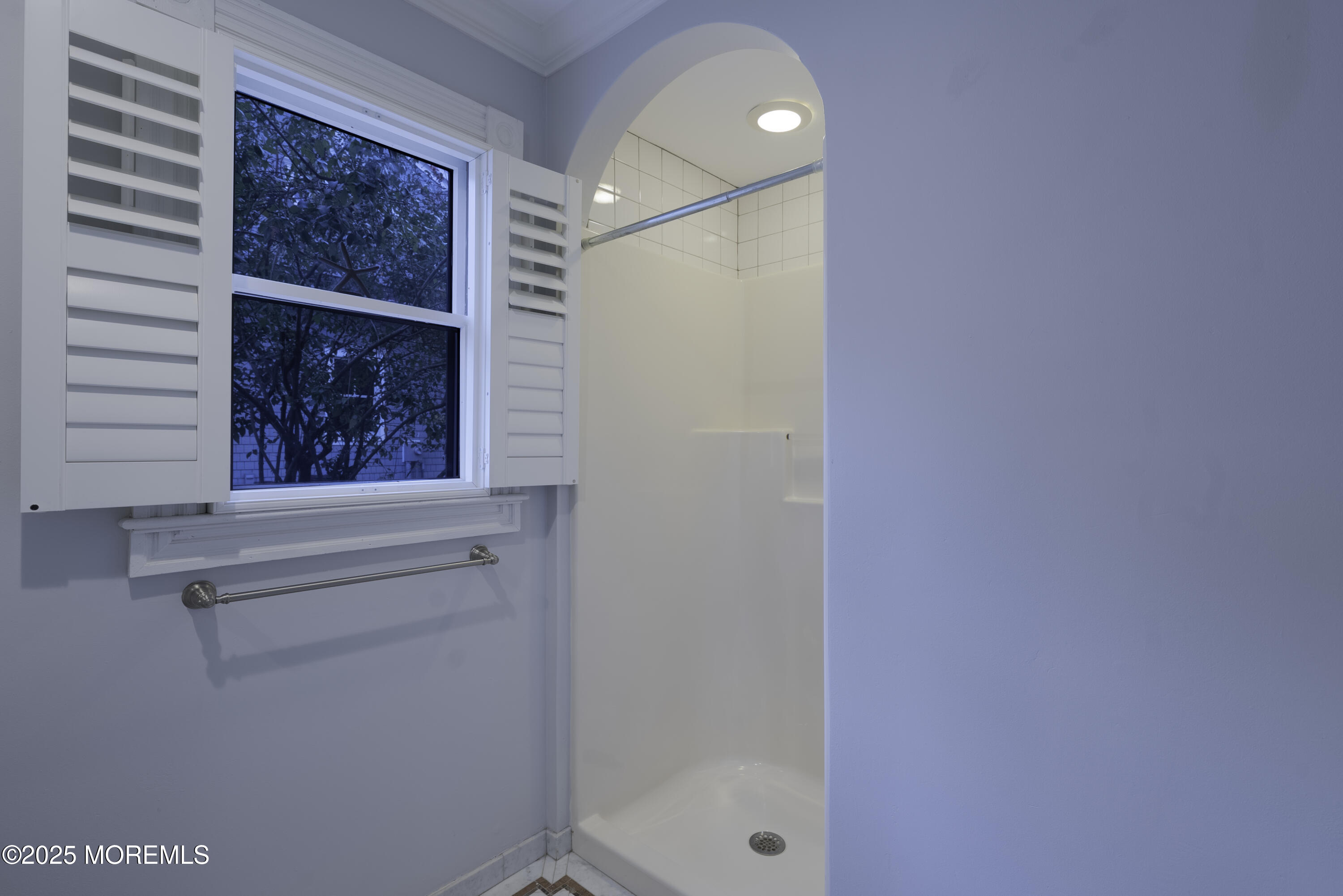7 Allen Street Rumson, NJ 07760 - Photo 17 of 36 a bathroom with a window and a shower