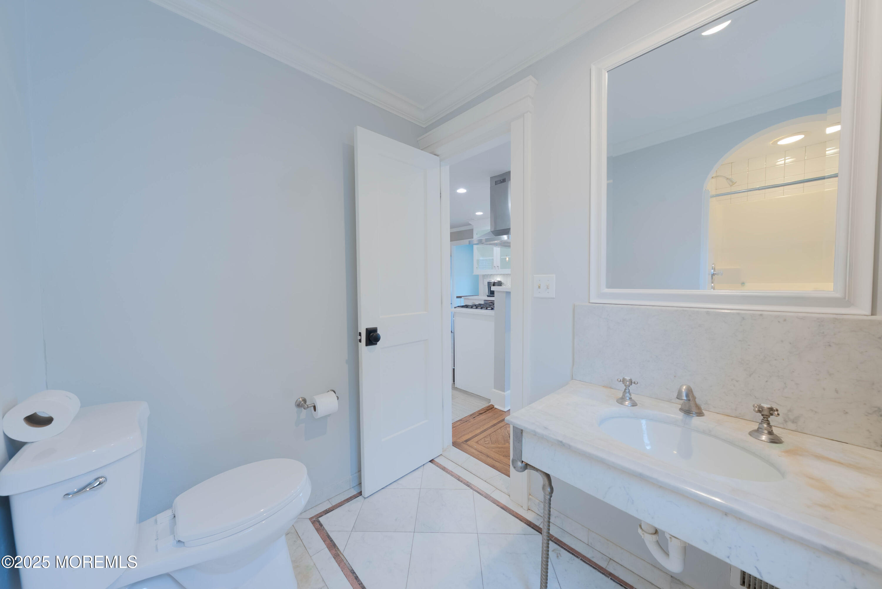 7 Allen Street Rumson, NJ 07760 - Photo 18 of 36 a bathroom with a granite countertop sink mirror vanity and toilet