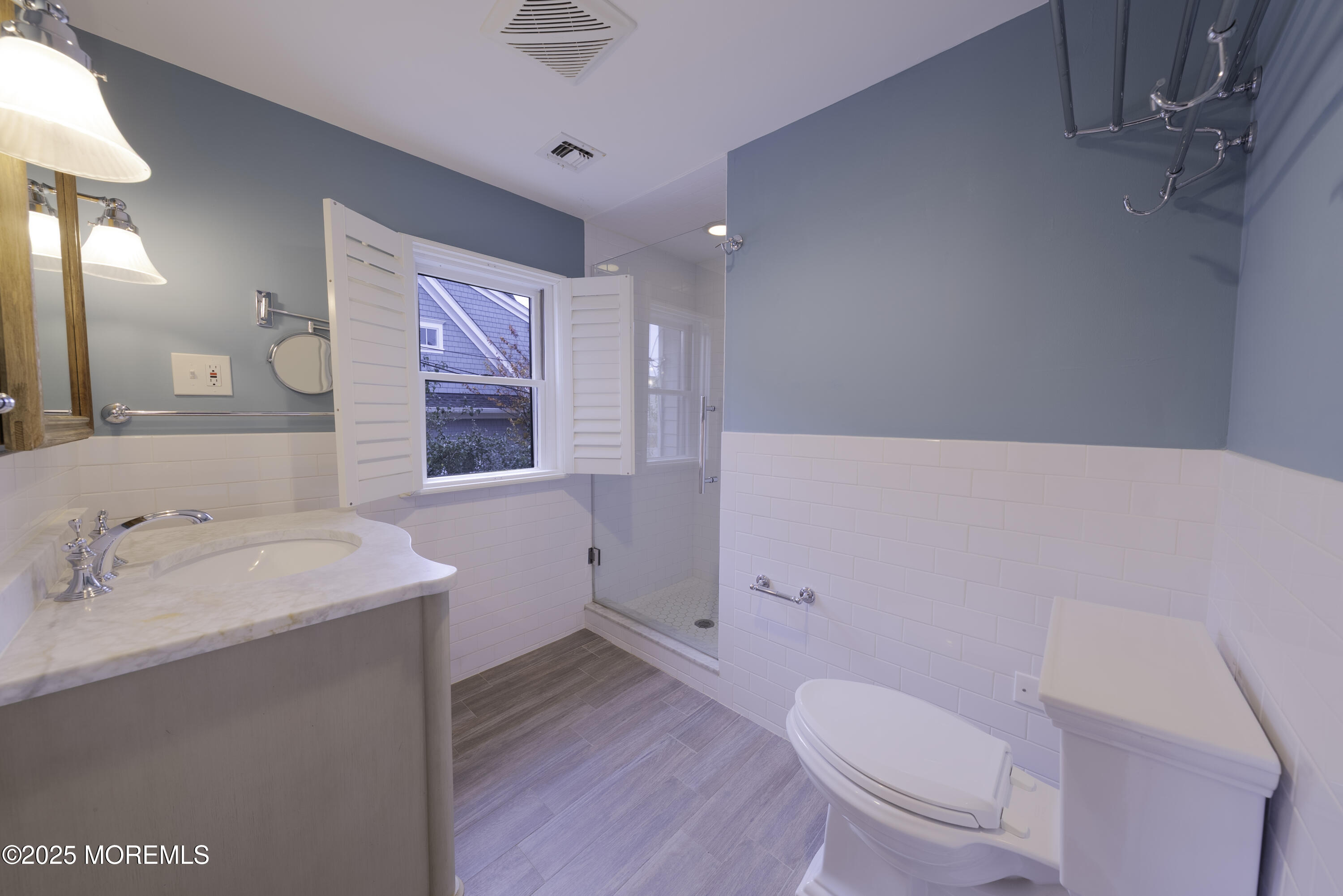 7 Allen Street Rumson, NJ 07760 - Photo 29 of 36 a bathroom with a sink toilet and mirror