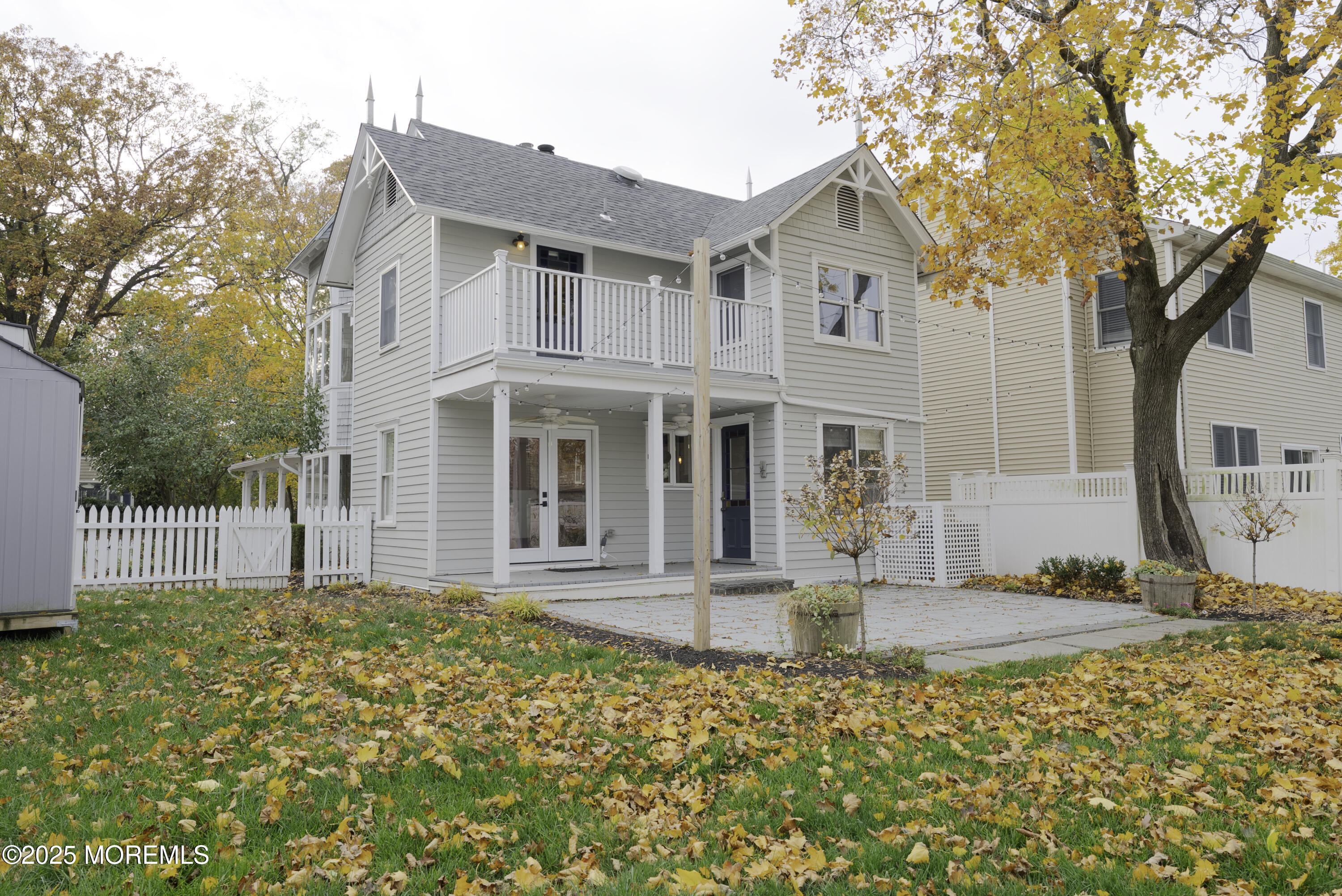 7 Allen Street Rumson, NJ 07760 - Photo 35 of 36 a front view of a house with garden