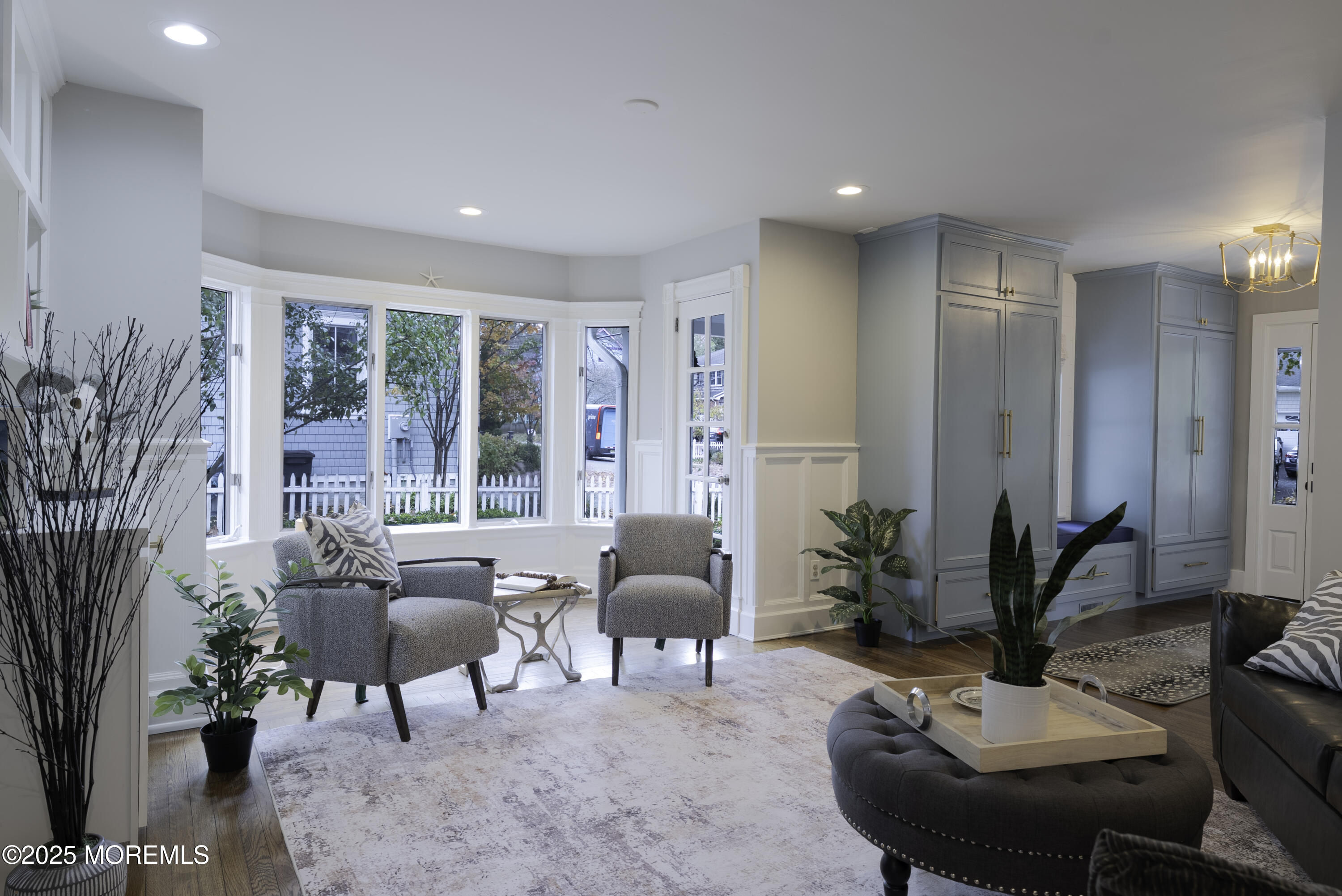 7 Allen Street Rumson, NJ 07760 - Photo 10 of 36 a living room with furniture and potted plants
