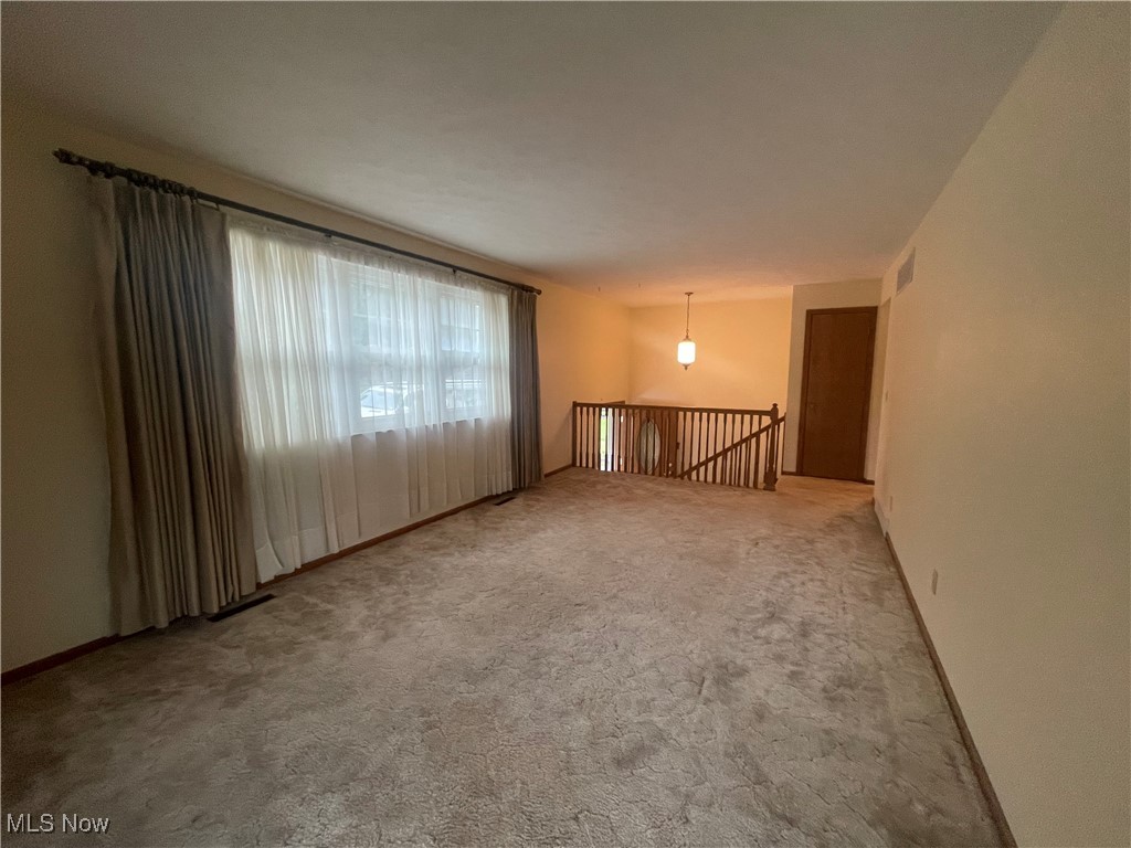3707 River Road Vienna, WV 26105 - Photo 8 of 35 Spare room featuring carpet floors