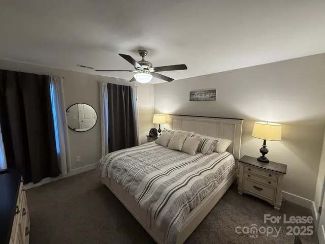 a bedroom with a bed and a closet