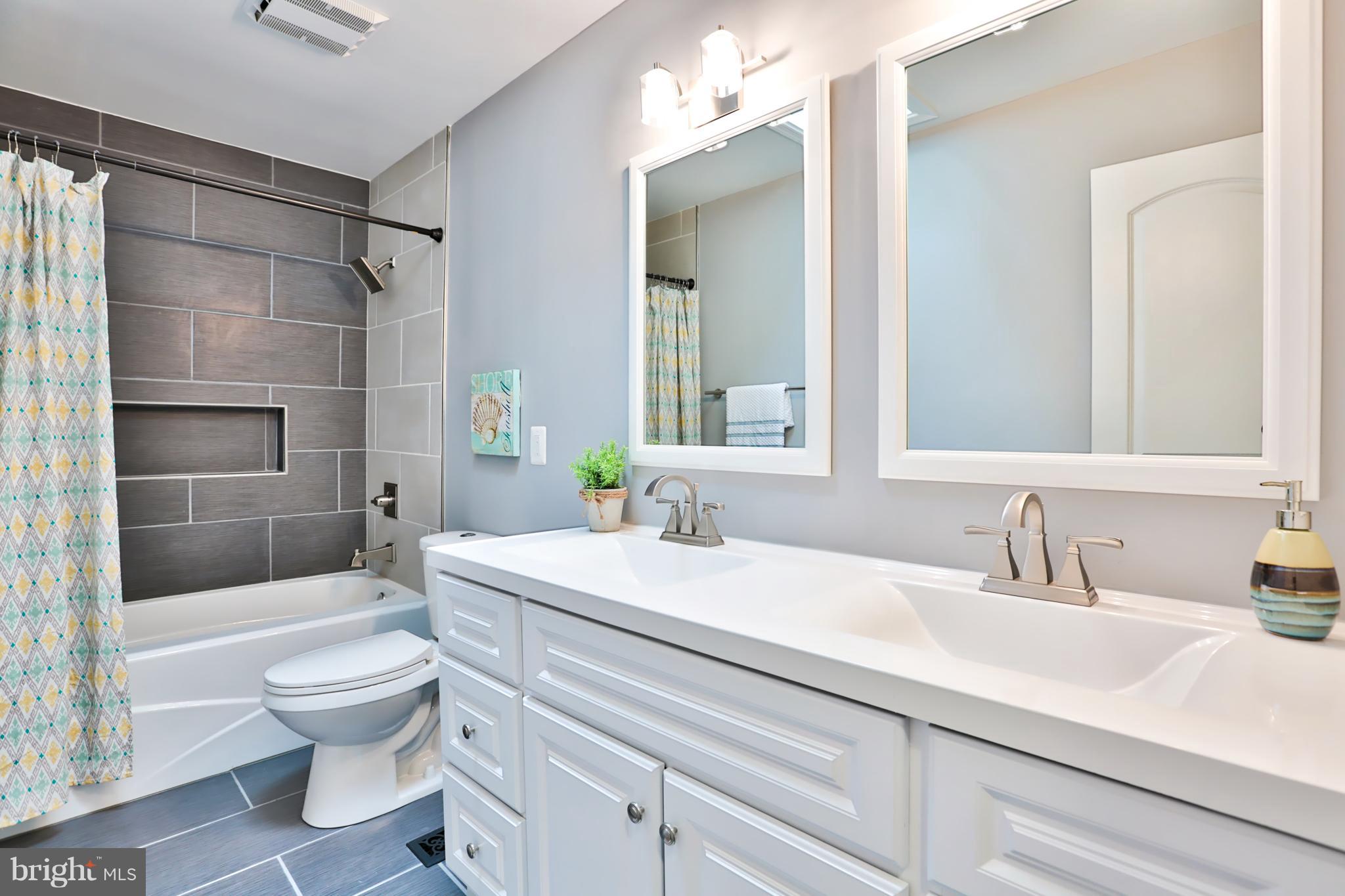 1649 Homewood Road Annapolis, MD 21409 - Photo 26 of 30 Sleek Vanities And Tile Shower