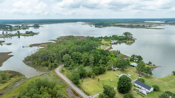 a view of a lake with a yard