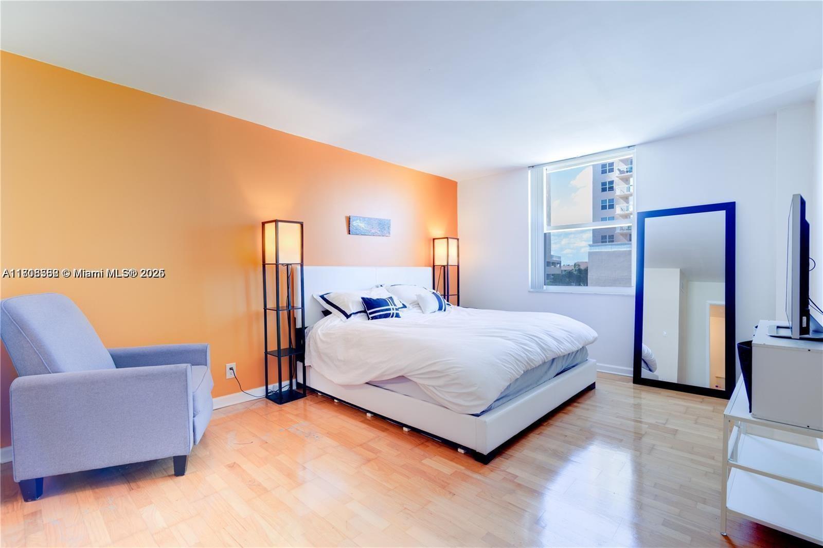 430 Golden Isles Drive, Unit 301 Hallandale Beach, FL 33009 - Photo 11 of 20 Primary Bedroom