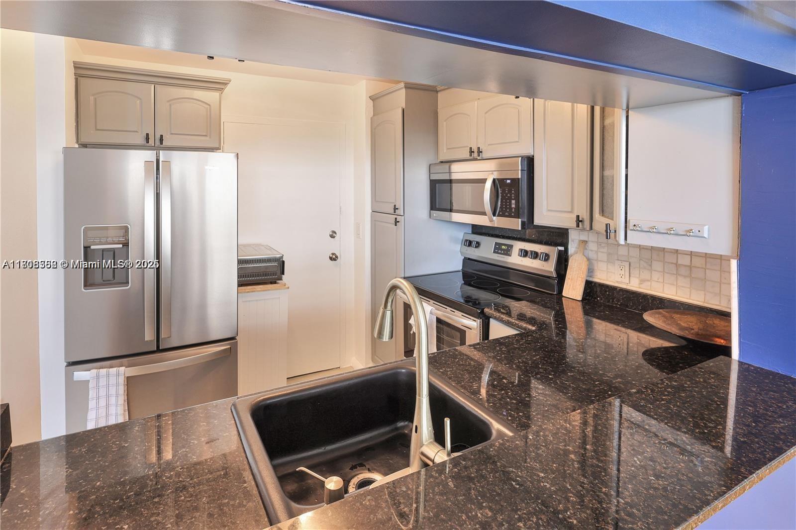 430 Golden Isles Drive, Unit 301 Hallandale Beach, FL 33009 - Photo 5 of 20