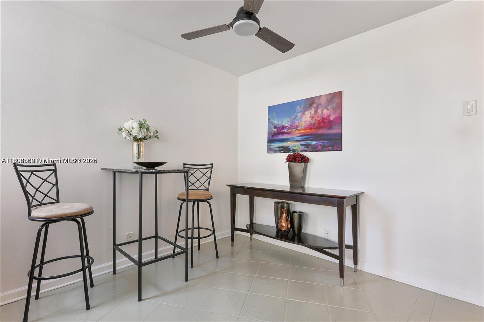 430 Golden Isles Drive, Unit 301 Hallandale Beach, FL 33009 - Photo 8 of 20 Dining or office space next to kitchen