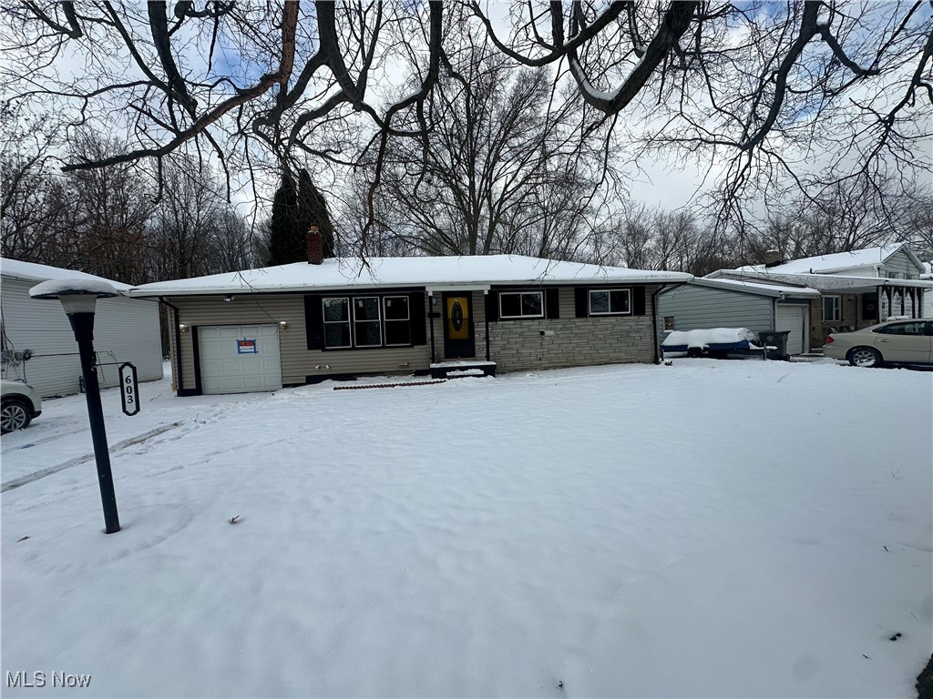 603 Liberty Road Youngstown, OH 44505 - Photo 1 of 42 Ranch-style home with an attached garage and a chimney