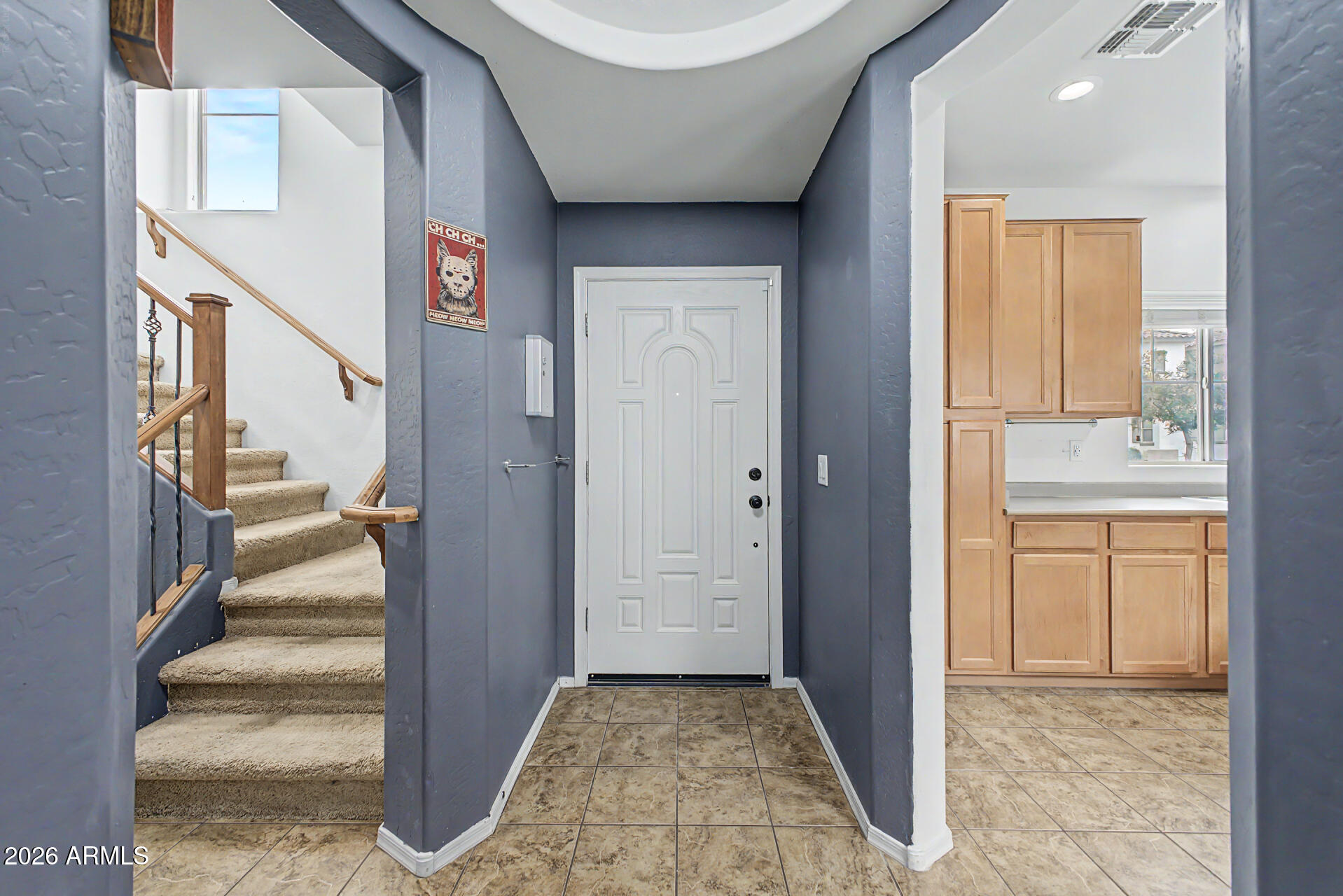435 North Ranger Trail Gilbert, AZ 85234 - Photo 4 of 20 a view of an entryway with staircase