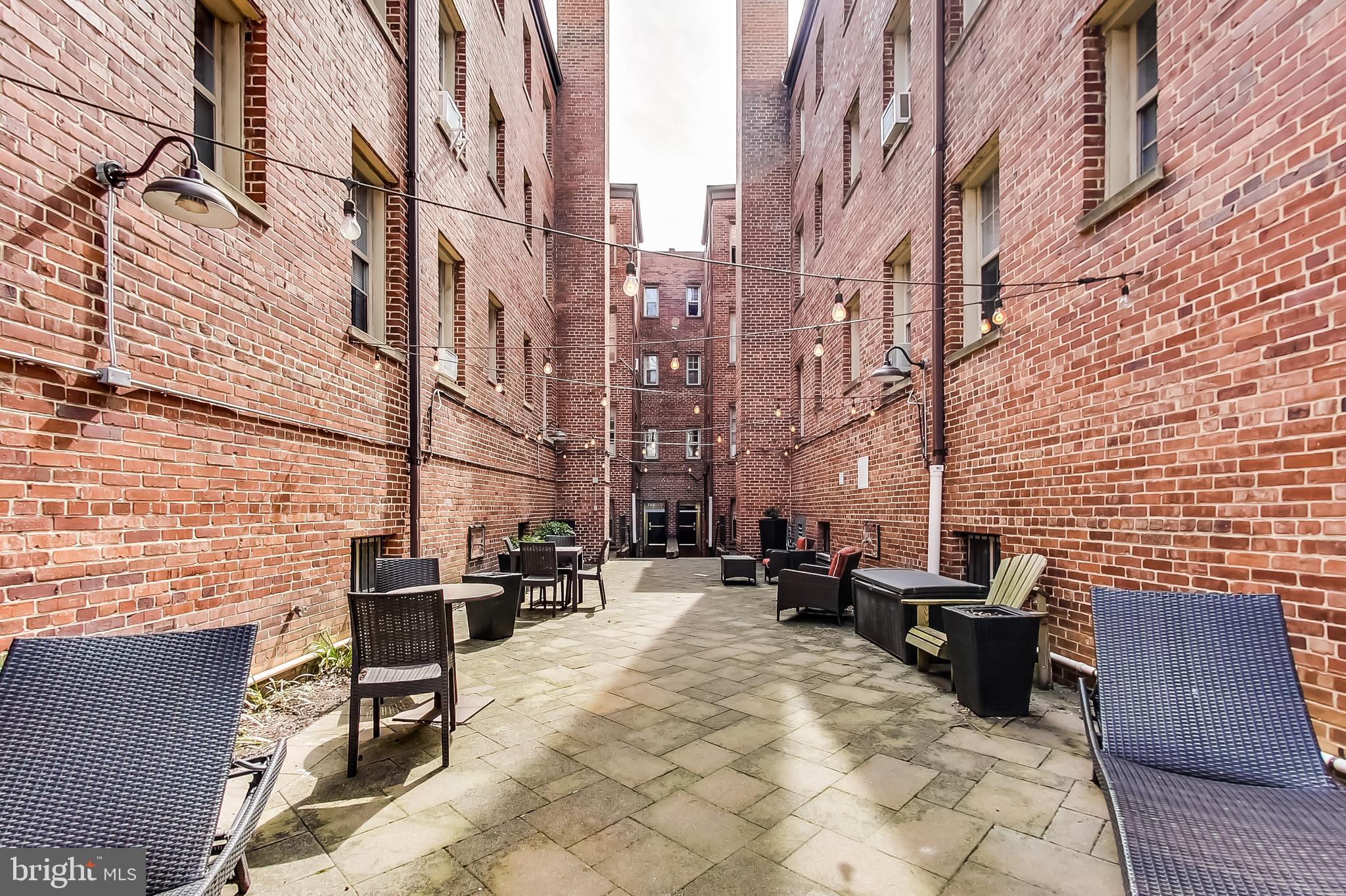 1441 Euclid Street Northwest, Unit 105 Washington, DC 20009 - Photo 15 of 20 a view of a brick building with many windows