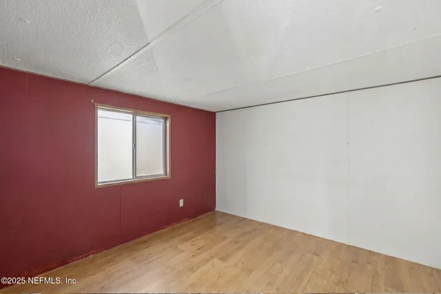 a bathroom with a toilet and shower