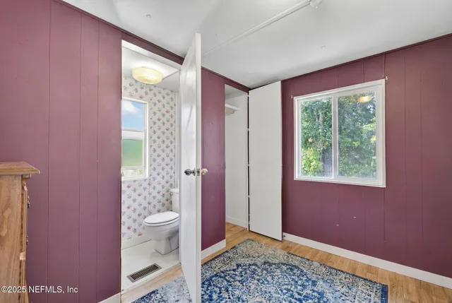 a bathroom with a shower curtain