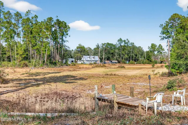 a view of a lake with outdoor space