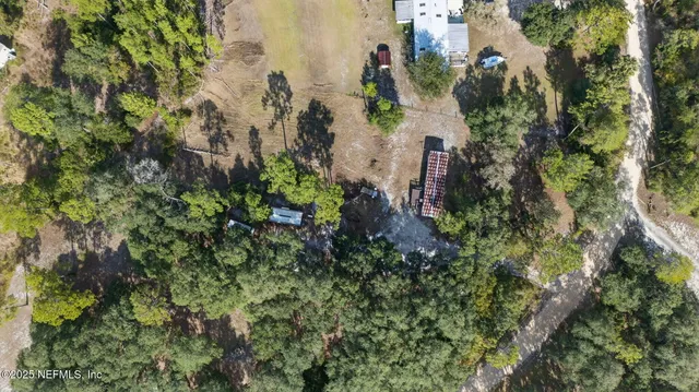 a view of a lake with a yard