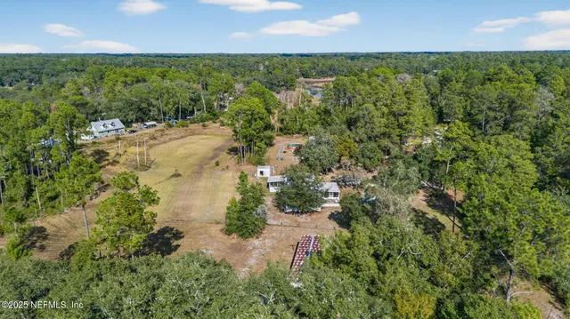 a backyard of a house with lots of green space