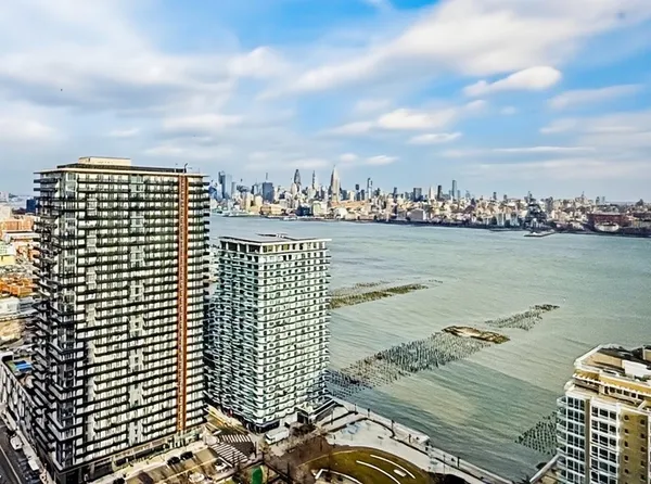 a view of a city with ocean