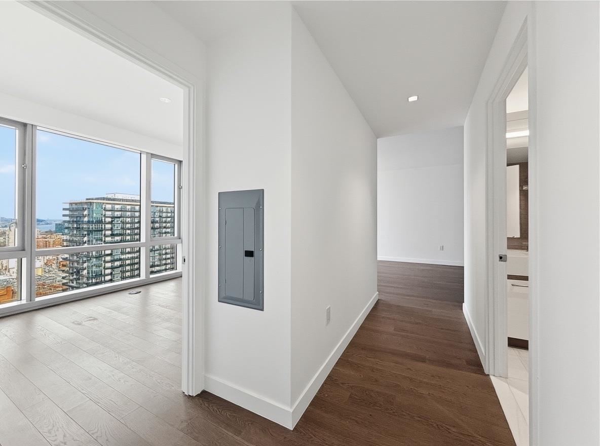 75 Park Lane South, Unit 3202 Jersey City, NJ 07310 - Photo 24 of 40 a view of hallway with wooden floor