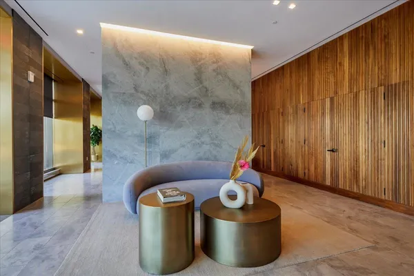 a living room with furniture and a rug