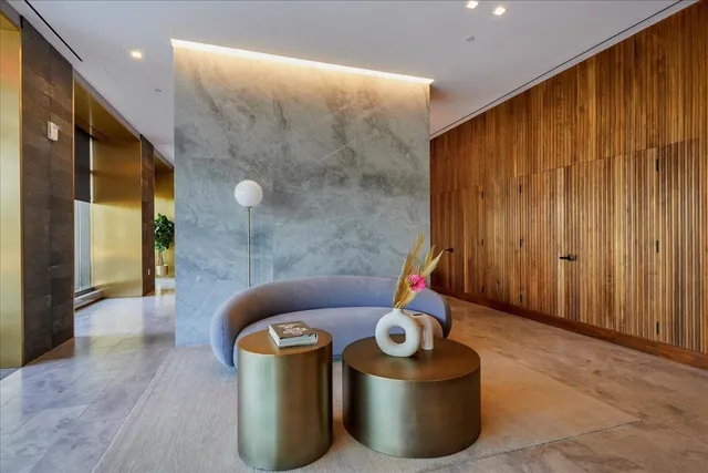 a living room with furniture and a rug