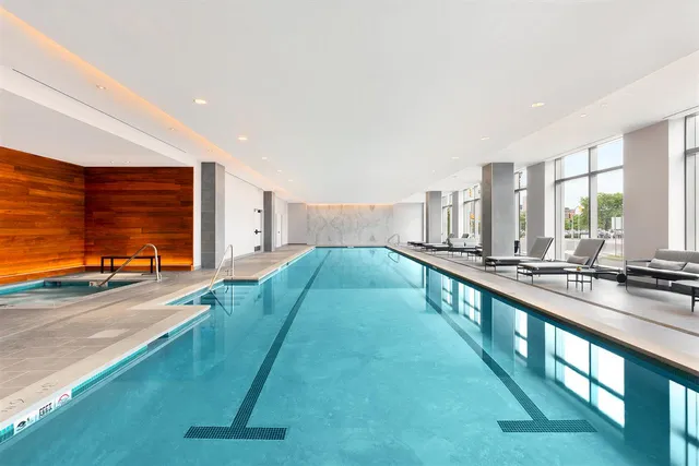 a outdoor space with tables and chairs