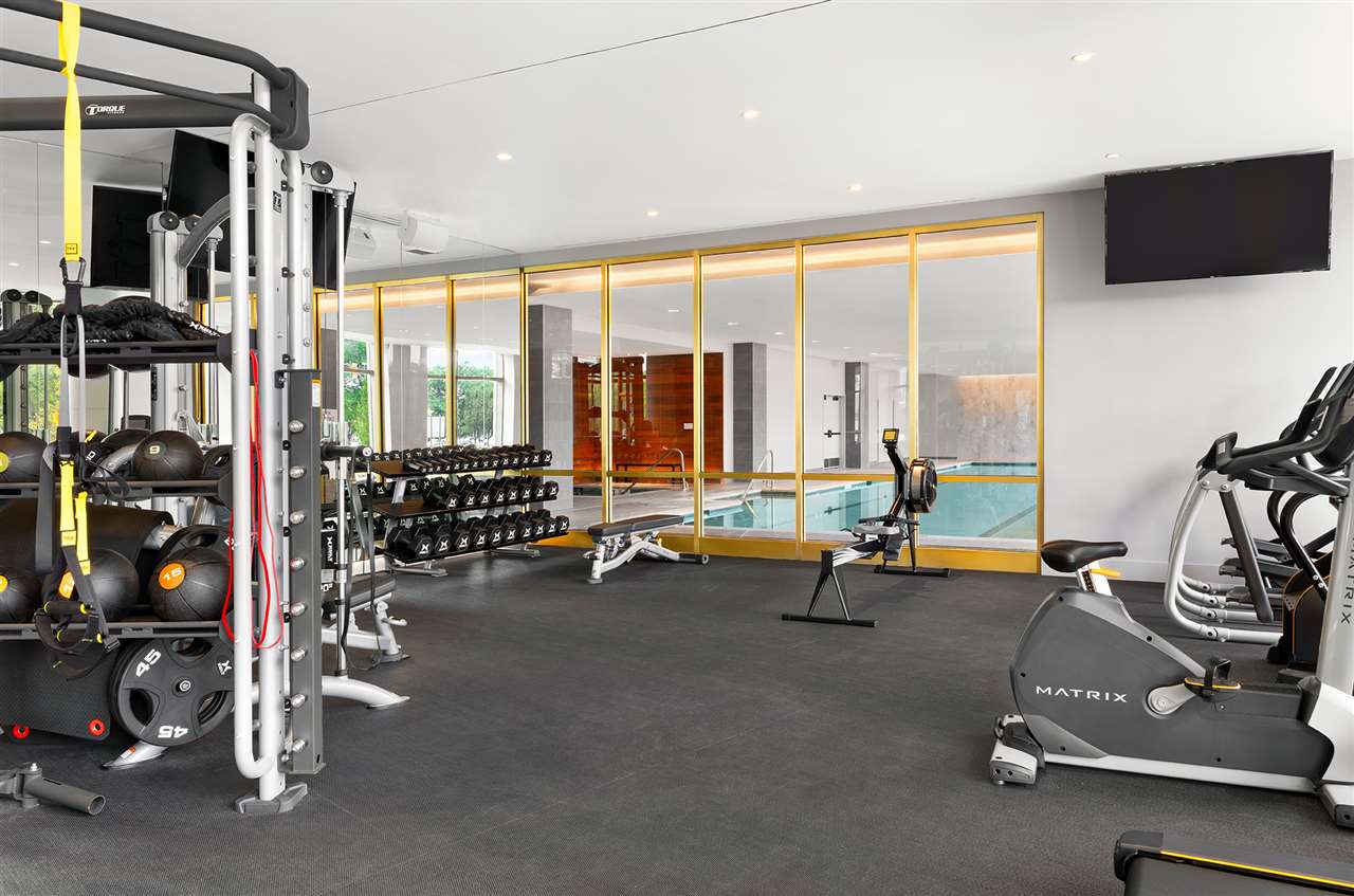 75 Park Lane South, Unit 3202 Jersey City, NJ 07310 - Photo 38 of 40 a view of a room with gym equipment