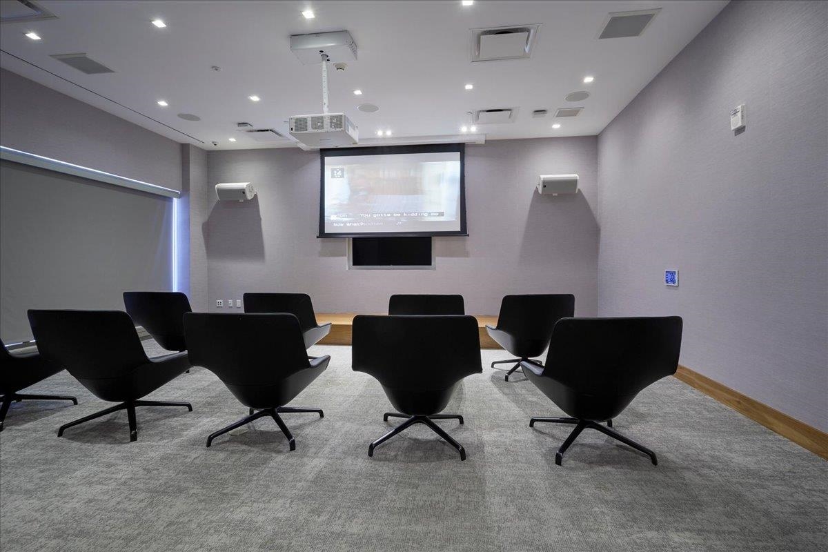 75 Park Lane South, Unit 3202 Jersey City, NJ 07310 - Photo 40 of 40 a living room with furniture and a flat screen tv