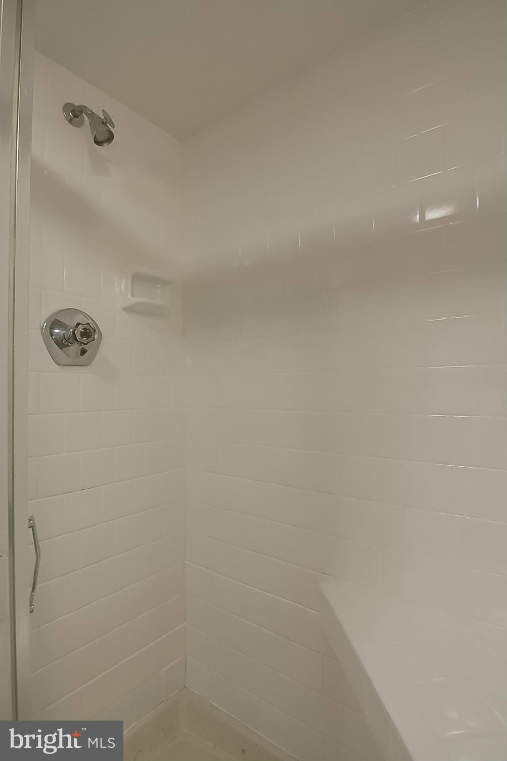 3704 Vega Road Randallstown, MD 21133 - Photo 21 of 25 a bathroom with a shower
