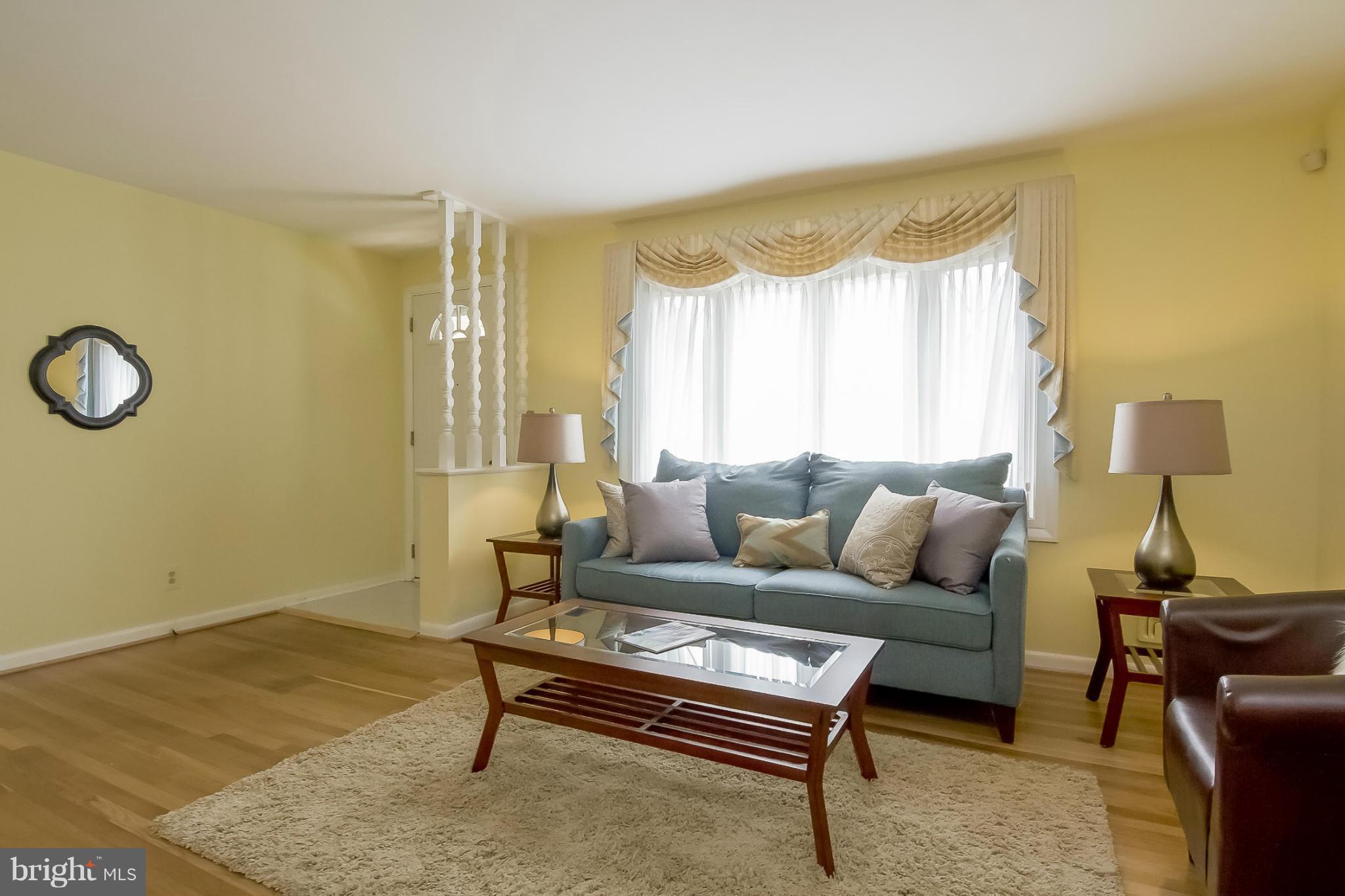 3704 Vega Road Randallstown, MD 21133 - Photo 4 of 25 a living room with furniture and a window