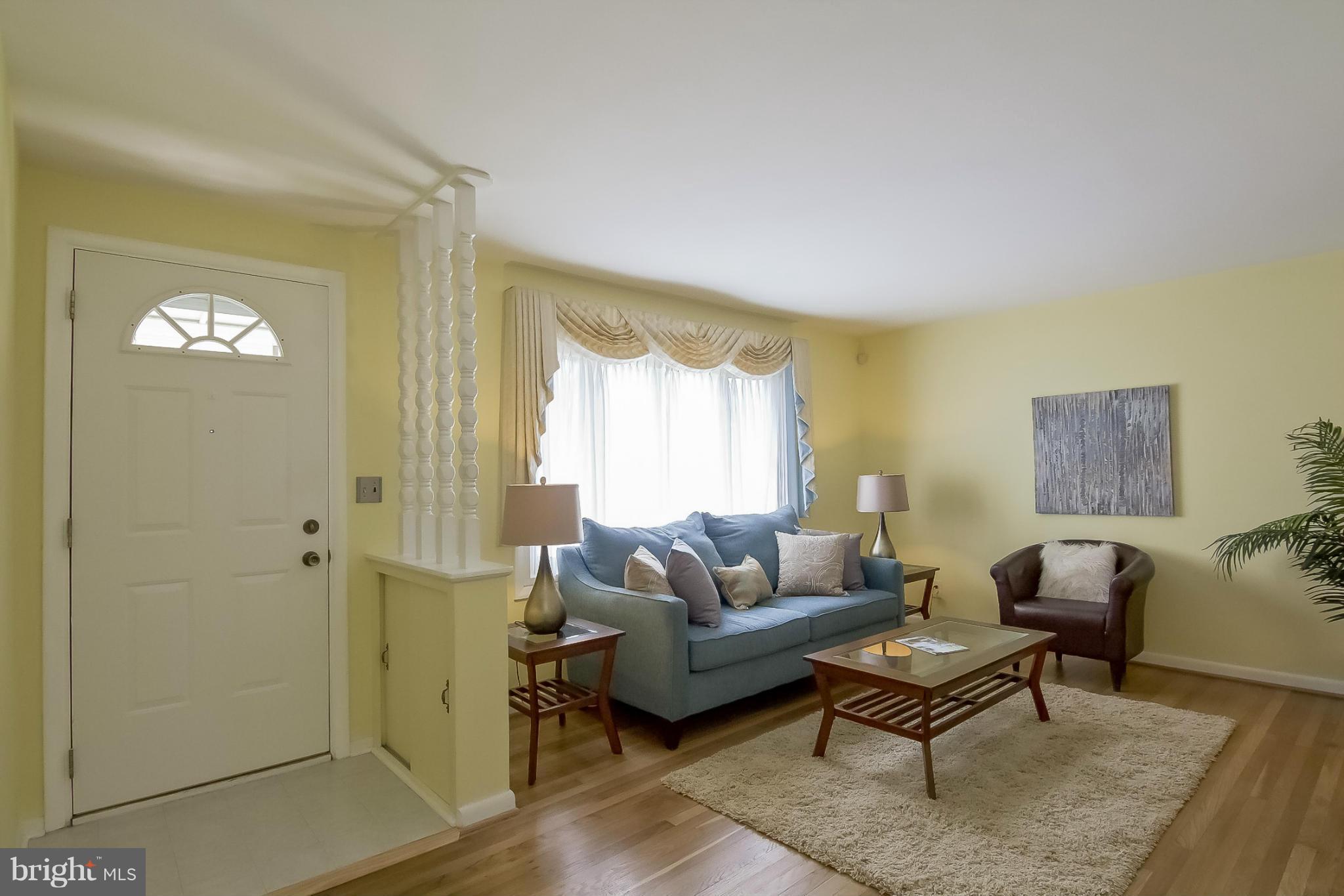 3704 Vega Road Randallstown, MD 21133 - Photo 5 of 25 a living room with furniture and a window