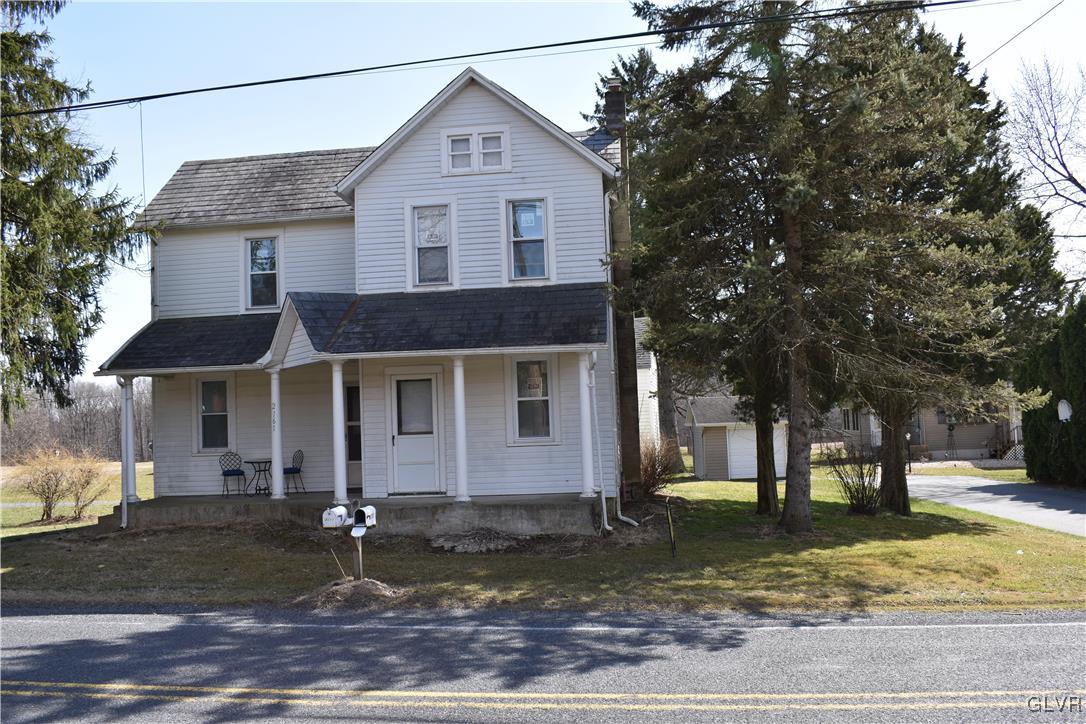 2161 East Scenic Drive Bath, PA 18014 - Photo 1 of 27 a front view of a house with garden