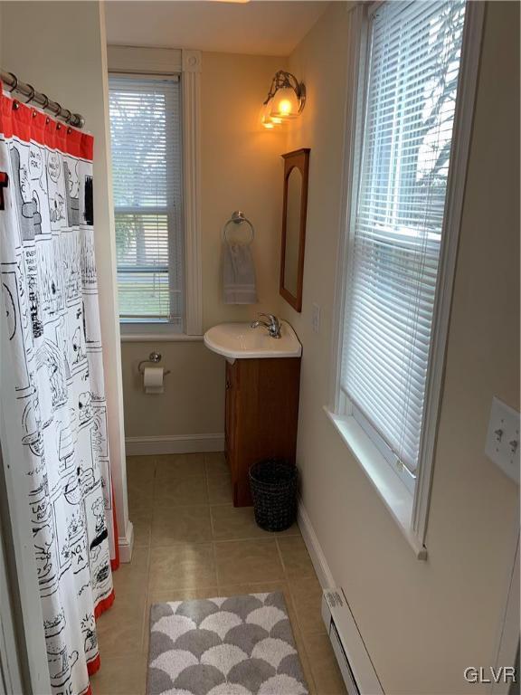 2161 East Scenic Drive Bath, PA 18014 - Photo 18 of 27 a bathroom with a sink a toilet and shower