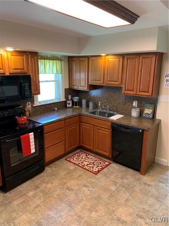 2161 East Scenic Drive Bath, PA 18014 - Photo 4 of 27 a kitchen with sink cabinets and window