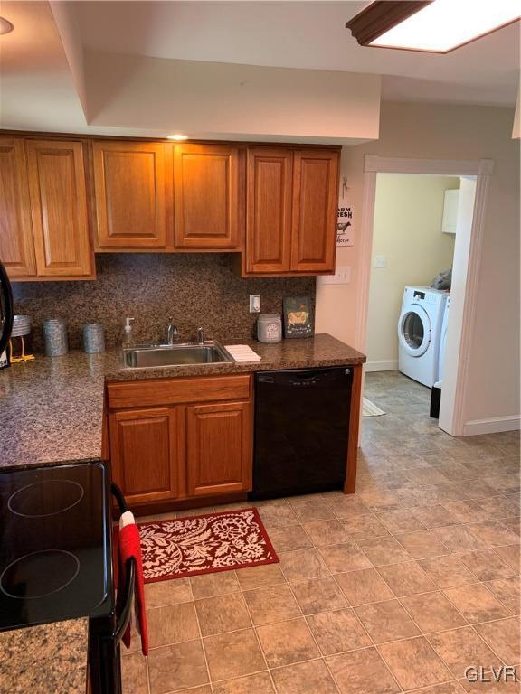 2161 East Scenic Drive Bath, PA 18014 - Photo 6 of 27 a kitchen with stainless steel appliances granite countertop a stove a sink and a microwave