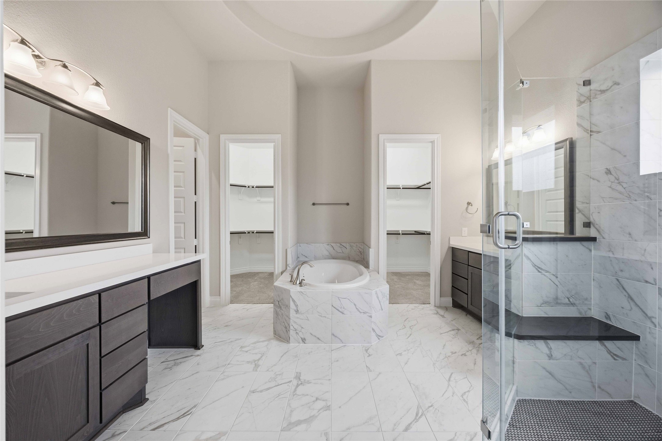 17564 Watercolor Way Conroe, TX 77302 - Photo 23 of 42 En Suite luxury primary bath has dual vanities, soaking sub, separate shower and two closets