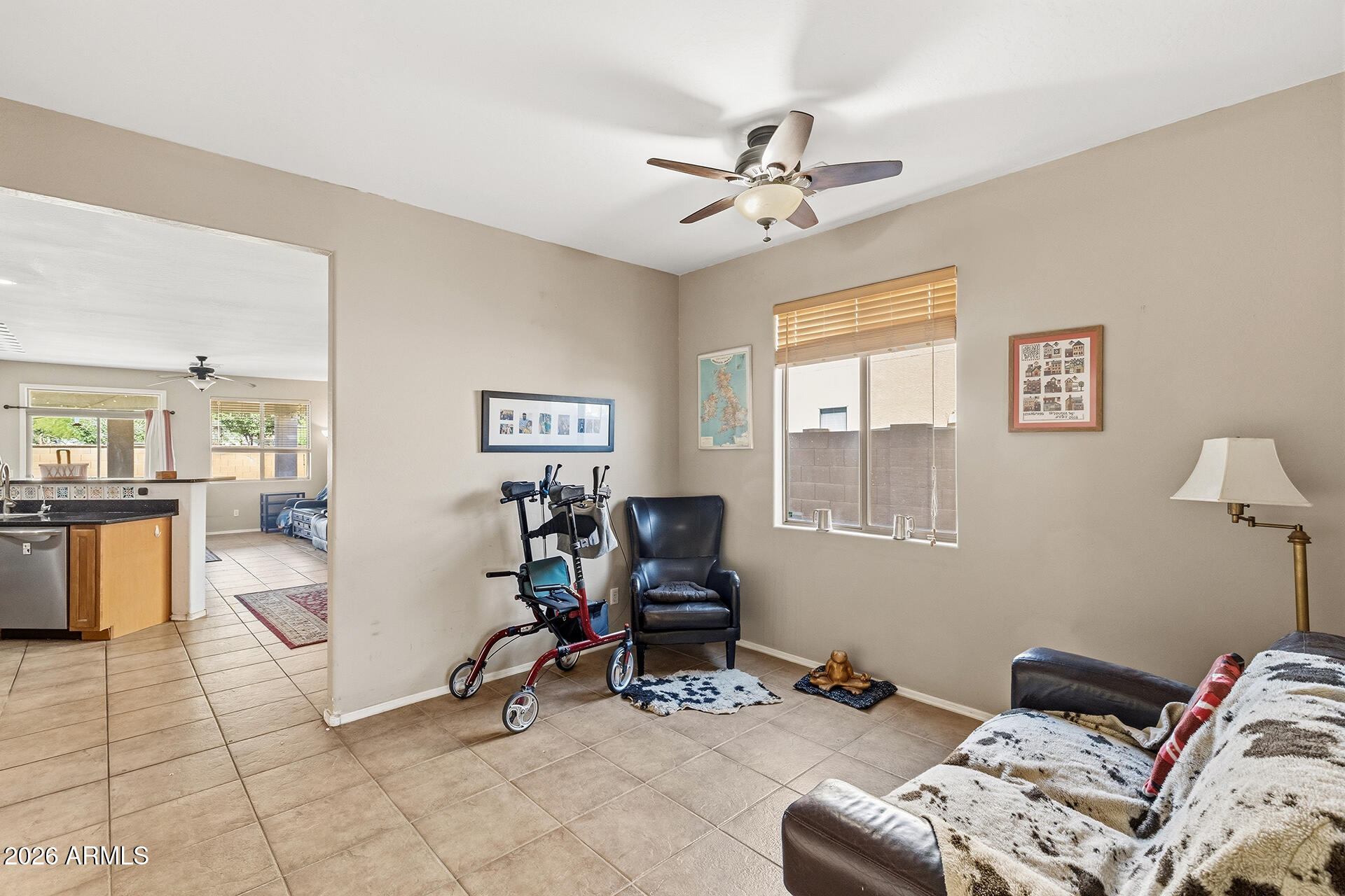 6718 West Darrel Road Laveen, AZ 85339 - Photo 28 of 49 a view of a livingroom with workspace and a window