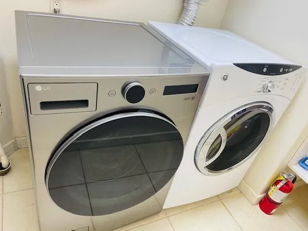 a utility room with dryer and washer