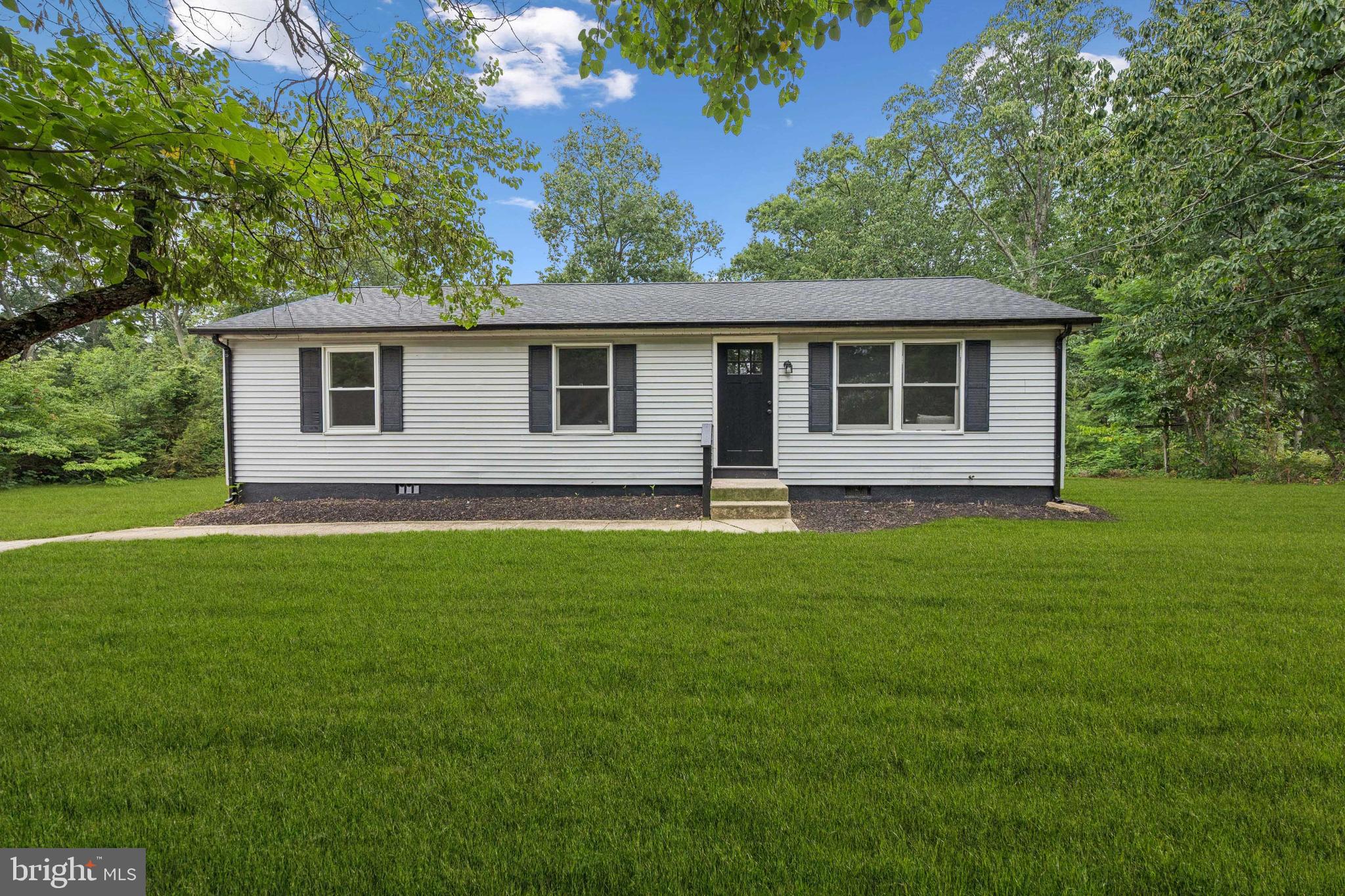 651 Erial Road Sicklerville, NJ 08081 - Photo 1 of 24 a front view of house with yard and green space