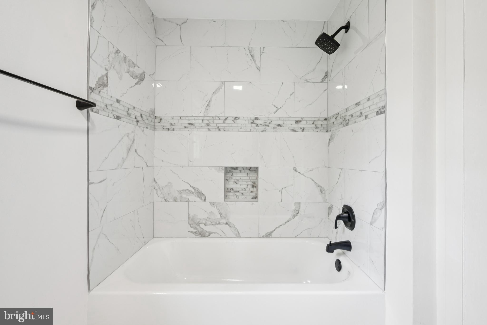 651 Erial Road Sicklerville, NJ 08081 - Photo 18 of 24 a bathroom with a bathtub