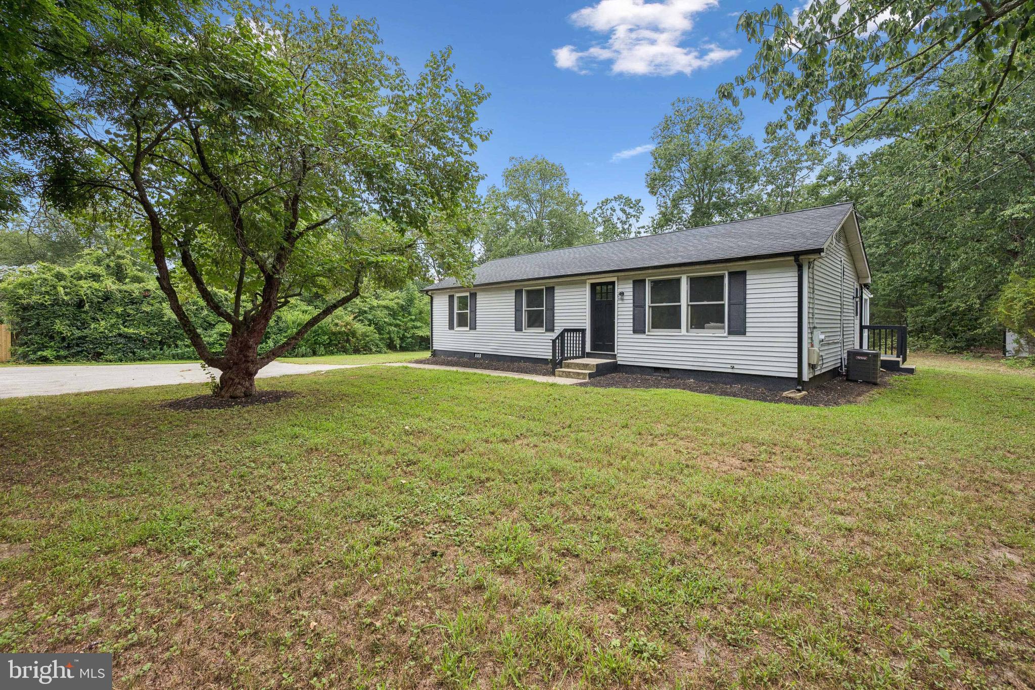 651 Erial Road Sicklerville, NJ 08081 - Photo 2 of 24 a house view with a garden space